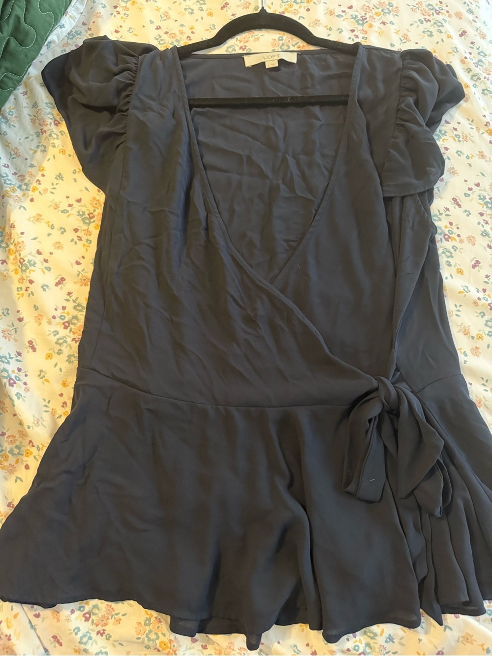 LOFT navy wrap top with flutter sleeves and side tie